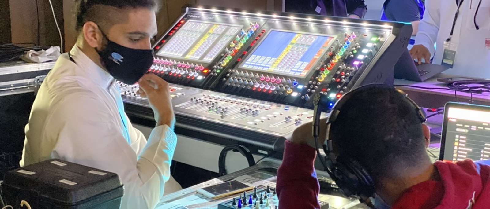 Sultan Hakeem at the production desk during a live event